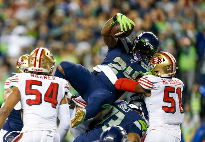 Seattle Seahawks running back Marshawn Lynch (24) rushes for a touchdown against the San Francisco 49ers during the fourth quarter at CenturyLink Field